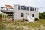 The front of the house show casing the upper and lower deck